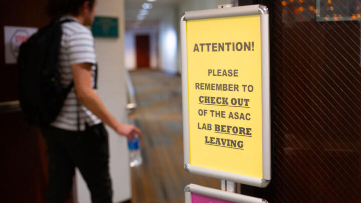 Closeup photo of a sign at a lab in Mt. San Antonio College that reminds students to check out of the lab before leaving